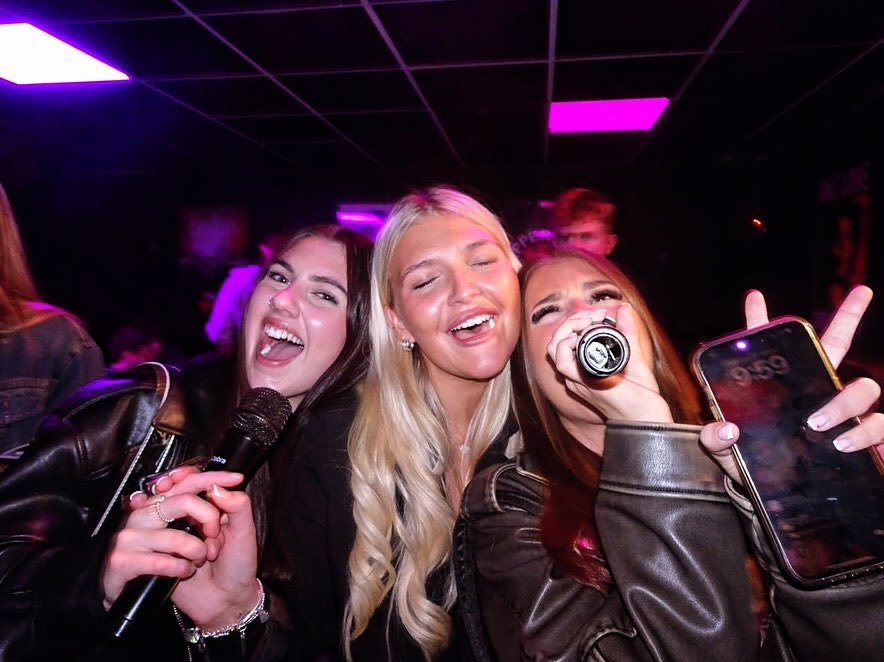 Guests singing Karaoke at No Name Bar and Games Colchester