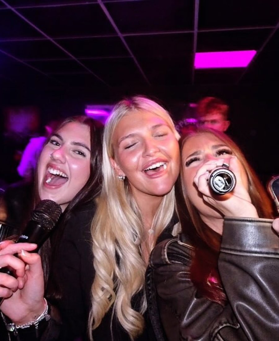 Guests singing Karaoke at No Name Bar and Games Colchester